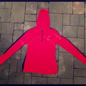 A pink thermal wear quarter zip hooded pullover.